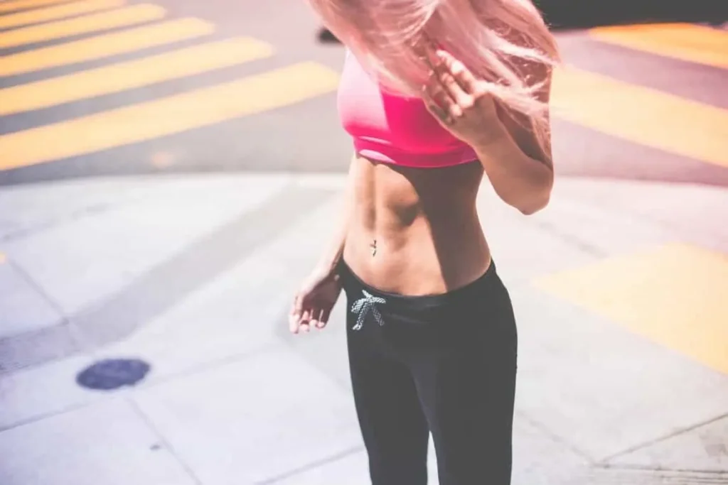 Woman with toned stomach after LA-EMS Body Sculpting Treatment North Harrow